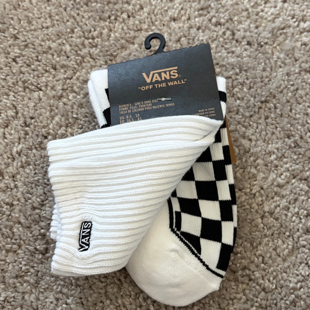 Vans sock with white and black checkered  slip on shoe. Women’s 6.5-10. NWT
